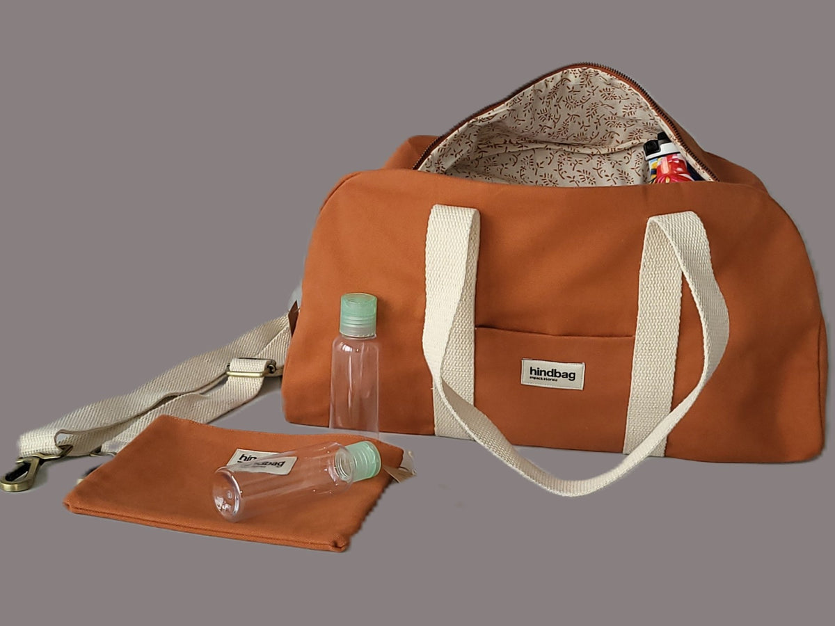 Sport- oder Wickeltasche Charlie mit Kulturtasche hier in orange